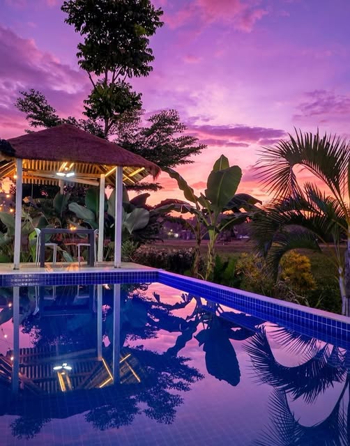 Private swimming pool at sunset included in the night swimming package